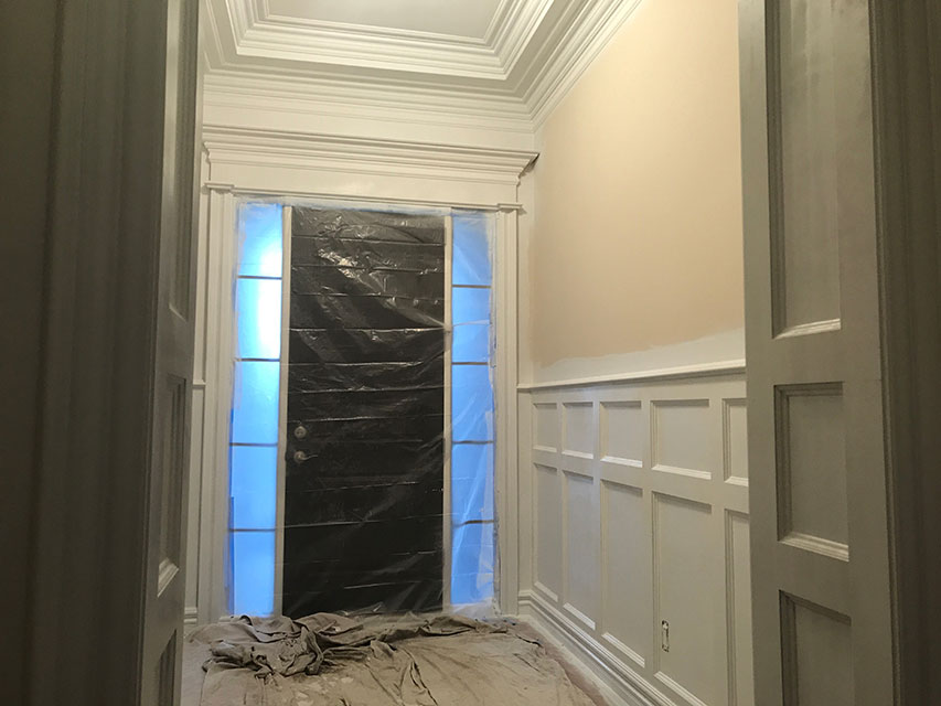 home entryway with wainscoting installation 