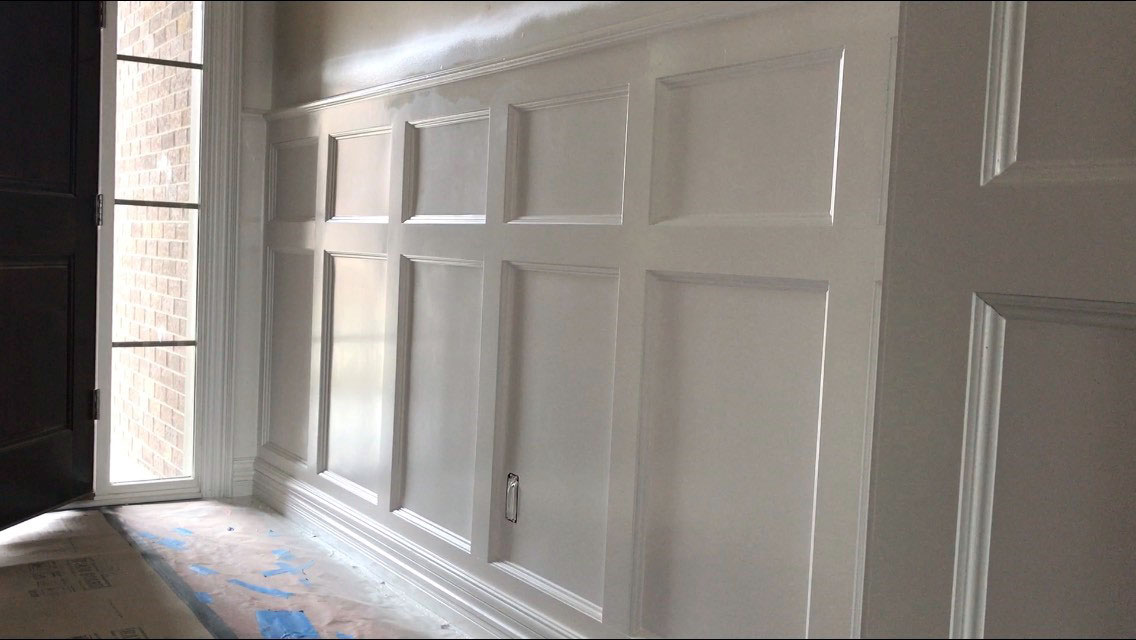 close up of wainscoting in foyer