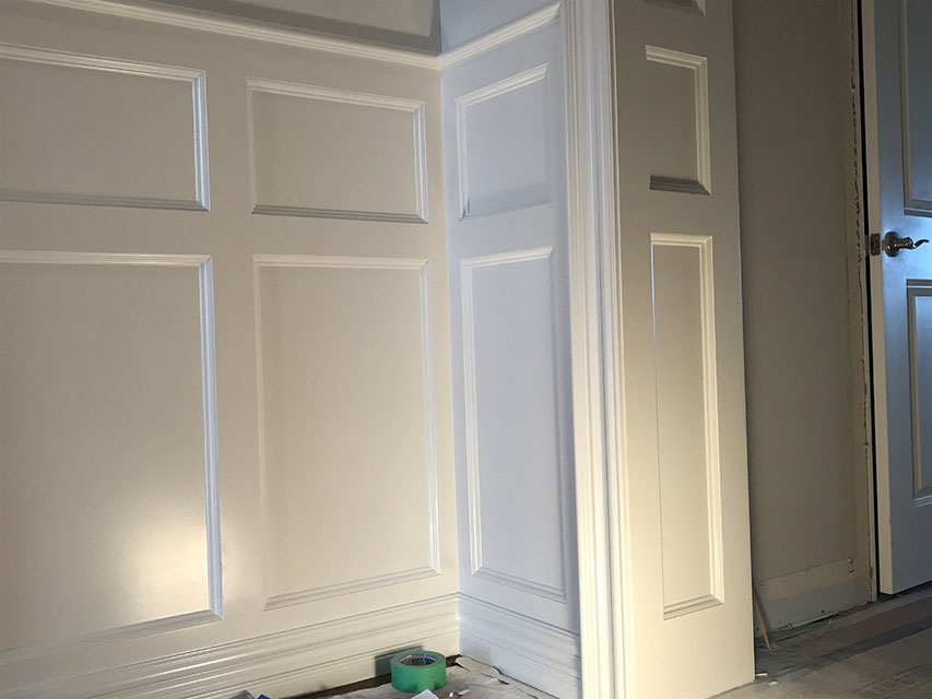closeup of finished white wainscoting